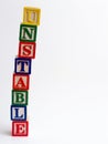 Unstable tower of blocks Royalty Free Stock Photo