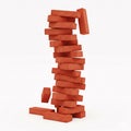An unstable tower of red bricks, exuding precariousness, stands elegantly Royalty Free Stock Photo