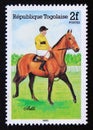 Unused post stamp Republic Togo 1985, Arkle horse riding Royalty Free Stock Photo