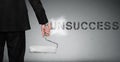 Unsuccess word painting on wall Royalty Free Stock Photo