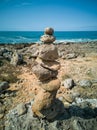 Untamed Beauty Rugged Island Beach with Crashing Waves & Rocky Shore Royalty Free Stock Photo