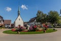 UNTERUHLDINGEN, GERMANY - SEPTMBER 3, 2019: Roundabout and St Quirinius chapel in Unteruhldingen town, Baden-Wurttemberg