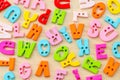 Untidy collection of plastic alphabet letters, school education