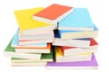 Untidy pile of books, front view, isolated on white background