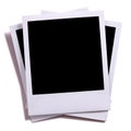 Untidy stack three blank instant camera polaroid photo prints