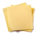 Untidy stack yellow sticky post notes isolated on white background Royalty Free Stock Photo