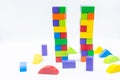 Untidy variety colorful blocks two tower same 9/11