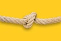 Untie the knots - problem solving concept image on yellow background