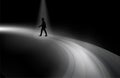 Man silhouette walking on a road through dark Royalty Free Stock Photo
