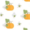 Vector seamless and cute pattern of ripe pumpkin and green leafs.