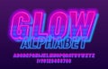 Glow alphabet font. Neon light letters and numbers. Royalty Free Stock Photo