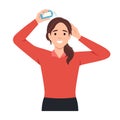 Young woman sprinkle hair care products on her head. Flat vector
