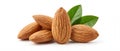 Pile of almonds with green leaves, close-up on a white background. Royalty Free Stock Photo