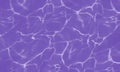 Rippled pattern of clean water in a violet swimming pool. Purple swimming pool surface