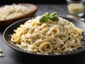 Fettuccine alfredo with parmesan cheese isolated on black background