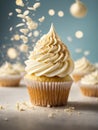 Delicious vanilla cupcake, whispered snow, swirl of creamy white frosting graces the top