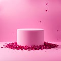 Round pink podium strewn with pink rose petals