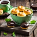 Coffee in green cups with cake on a wooden table with mint Royalty Free Stock Photo