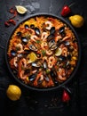 Paella, classic Spanish dish featuring saffron rice with chorizo, chicken, and seafood Royalty Free Stock Photo