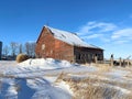 An old barn on the snowy prairie Royalty Free Stock Photo
