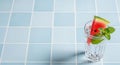 Refreshing Watermelon Mint Drink on Blue Tiles with Clean Minimal Background Royalty Free Stock Photo