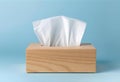 Wooden tissue box with white paper napkins for daily use Royalty Free Stock Photo
