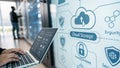 A person working on a laptop, displaying a technical interface focused on cloud storage. Royalty Free Stock Photo
