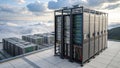 A rooftop data center installation with rows of server racks in a cloudy, mountainous location. Royalty Free Stock Photo