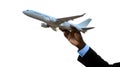 Professional Hand Holding Up White Model Airplane - Travel, Logistics, and Air Transport Concept - Isolated Royalty Free Stock Photo