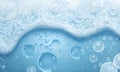 ubbles of various sizes float in a light blue, foamy liquid, creating an impression of effervescence Royalty Free Stock Photo