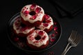 Red Velvet Donuts with Cream Cheese Glaze on Black Sta	- AI generated Royalty Free Stock Photo