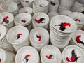 Malaysia November 2 2025 Tower of White Rooster Motif Ceramic Bowls Display Royalty Free Stock Photo