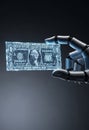 A robotic hand holds a transparent, holographic representation of a one-dollar bill against a dark background. ai Royalty Free Stock Photo