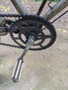 Worn bicycle crankset features a rusty,. Royalty Free Stock Photo