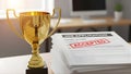 Success in Hiring: Job Application Accepted with Gold Trophy Royalty Free Stock Photo