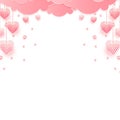 Pink hearts dangle from a layer of overlapping pink clouds at the top. The hearts vary in size Royalty Free Stock Photo