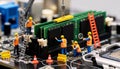 Mini Construction Workers Upgrading Computer Memory RAM Module Symbolizing Digital Performance Optimization Royalty Free Stock Photo