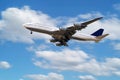 Untitled passenger plane flying at airport. Schedule flight travel. Aviation and aircraft. Air transport Royalty Free Stock Photo