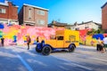 Untitled tourists visit the parking lot that displays the historic yellow car of Louis Vuitton on Jun 19, 2017 in