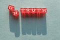 Untruth is a word made up of letters on cubes Royalty Free Stock Photo