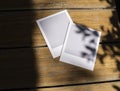 Unused instant photo films on wooden table Royalty Free Stock Photo