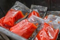 unused ketchup packets going into the bin Royalty Free Stock Photo