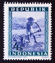 Unused postage stamp Republic Indonesia 1949, Paysant working the land