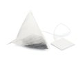 Unused pyramid tea bag with tag on white Royalty Free Stock Photo