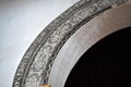 Unusual arch decorated by skull in San Antonio church in Frigiliana - Spanish white village Andalusia