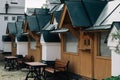 Unusual architecture. The triangular roofs of the cabins are in perspective.