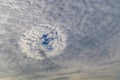 An unusual atmospheric phenomenon in a cloudy sky