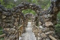 The unusual bridge of Antoni Gaudi in the gardens of Artigas