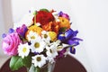 Unusual bright wedding bouquet with ranunculus