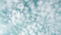 Unusual clouds in the turquoise sky as a background or backdrop